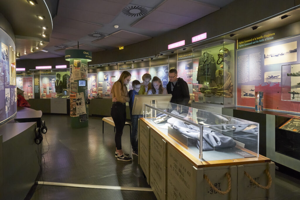 Visitors look at an exhibition on the Second World War at Juno Beach Centre in Normandy